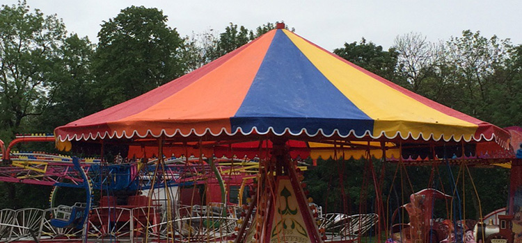 Multi coloured funfair ride cover