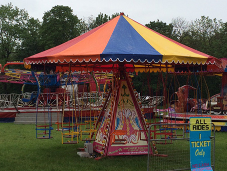 Multi coloured funfair ride cover